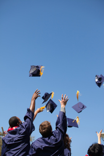 In the picture above, students are throwing their caps in excitement upon their graduation.
Credit: Sam Edwards/ gettyimages.com