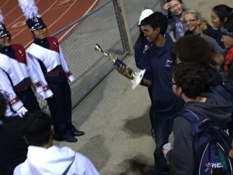 The Irish Guard celebrates after winning first in percussion