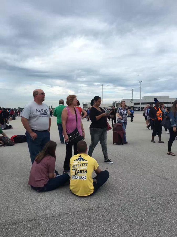 Anxious people await at the Fort Lauderdale Airport after the shooting.