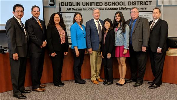 Dr. Marken, pictured in the middle, was appointed by the Board of Trustees in April 2019.