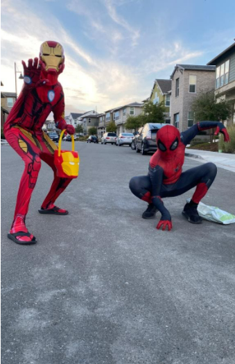 Two students that dressed up as Marvel characters to go trick-or-treating on Halloween night