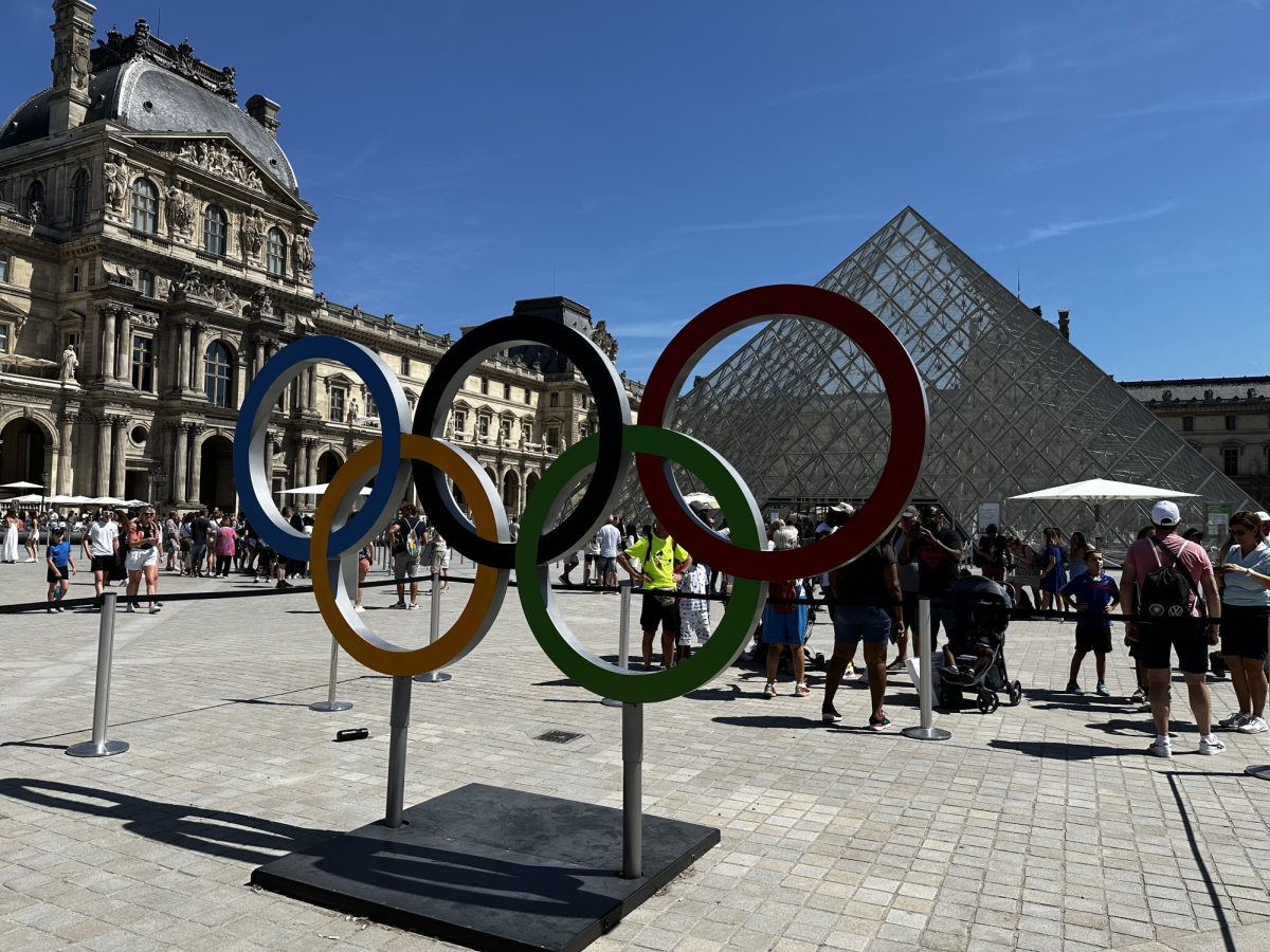 The Olympic rings featured in front of the Louvre Museum. 