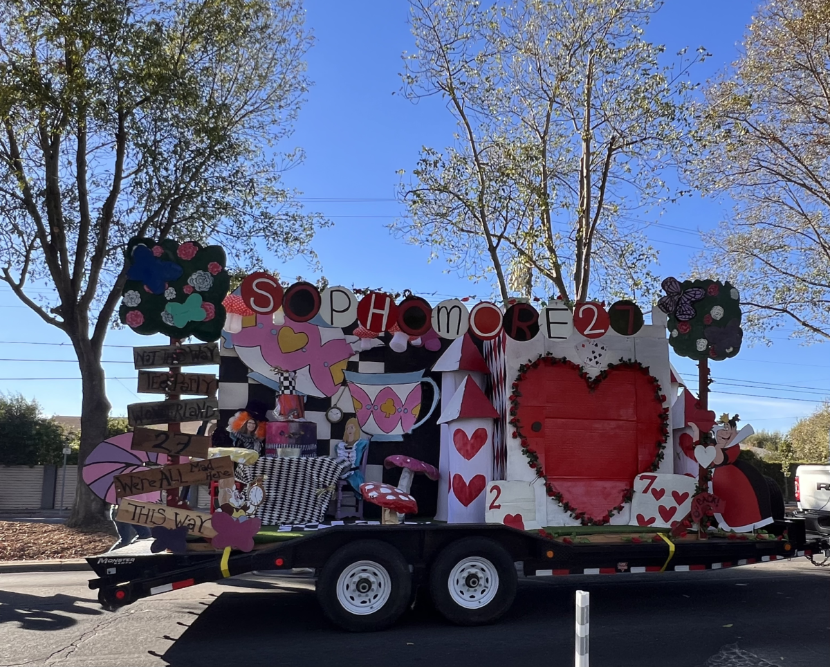 The sophomore float brought scenes from Alice in Wonderland to life with the usage of cards, mushrooms, and the Queen of Hearts herself.